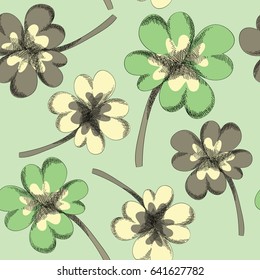 Clover leaves seamless pattern. Vector illustration on light green background