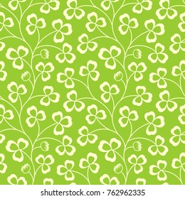 Clover leaves seamless vector pattern. St. Patrick's Day green background. Shamrock wallpaper