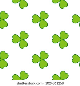 Clover leaves vector seamless pattern. Nature spring background. Irish traditional St. Patrick's day design element in green over white.