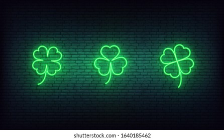 Clover neon icons. Set of green Irish shamrock icons for Saint Patrick's Day