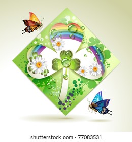Clover over decorative shapes of paper and colored abstract background with butterflies, rainbow and drops of water