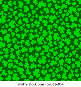 Clover seamless pattern in green colors. Pattern with shamrock. St. Patrick's Day clover endless repeat backdrop, texture, wallpaper. Luck symbol backdrop. Stock vector