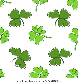 Clover seamless pattern. Clover pattern with three and four leaf. St. Patrick's Day hand-drawn chaotic clover endless repeat backdrop, texture, wallpaper. Luck symbol backdrop. Stock vector