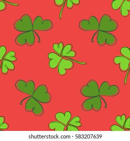 Clover seamless pattern with three and four leaf green on red background. St. Patrick's Day hand-drawn doodle style clover endless repeat backdrop, texture, wallpaper. Luck symbol. Stock vector