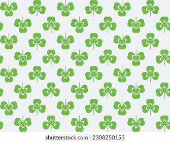 Clover, shamrock. Seamless pattern of green clover leaves. Vector illustration isolated on a light gray background.