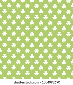 Clover shamrok seamless pattern on light green background vector illustration. Happy St. Patrick's Day