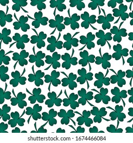 Clover. Trefoil. Repeating vector pattern. Isolated colorless background. Seamless summer ornament. The symbol of Ireland. Delicate floral background. Three sheets. Cartoon style. Saint Patrick Day. 