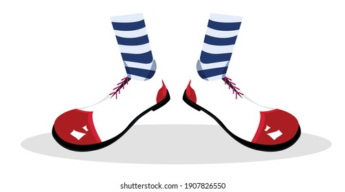 clown white shoes with a red toe. striped socks.isolated image of clown shoes.