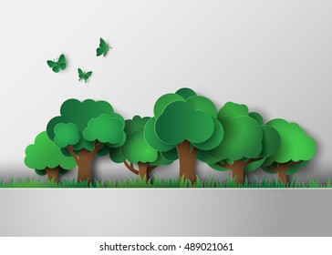 Cluster of paper cut green trees on grass field in clean environmental scene.