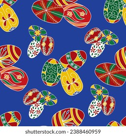 Clusters of colorful Ukrainian Easter eggs are scattered across this blue background creating a seamless repeat vector pattern design