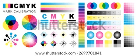 Cmyk calibration chart with color wheels and test patterns for printing accuracy.