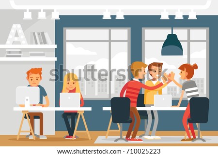 Co working space interior with people freelancers working. Loft interior. Start up business. Young people working together.Team building, coworkers, teamwork,start up concept.giving high five clapping