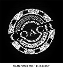 Coach on blackboard