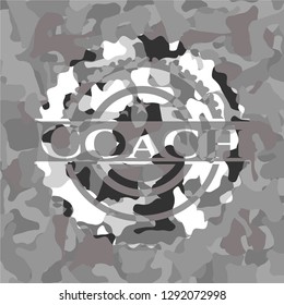 Coach on grey camouflaged texture