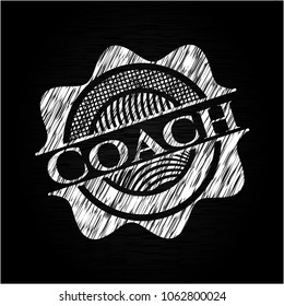 Coach written on a blackboard