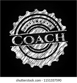 Coach written on a chalkboard