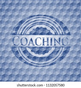 Coaching blue emblem with geometric background.