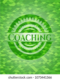 Coaching green emblem with triangle mosaic background