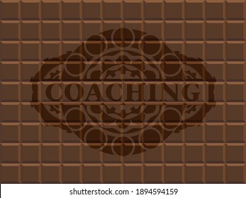 Coaching text inside chocolate bar emblem. Brown fancy background. Artistic illustration. 