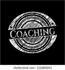 Coaching written on a blackboard