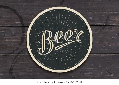 Coaster for beer with hand drawn lettering Beer. Monochrome vintage drawing for bar, pub and beer themes. Black circle for placing a beer mug or a bottle over it with lettering. Vector Illustration