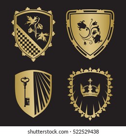 Coat of arms - shield silhouettes with crown, key, flowers in gold color. For signs and symbols (safety, security, military, medieval). Based on and inspired by old heraldry.
