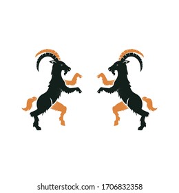 Coat of arms two standing goats , heraldry symbol. Goat animal logo design Vintage design of heraldic black animals, vector emblem. Heraldic elements for your design, engraving, retro style.