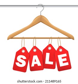 coat hanger and sale tag on white background