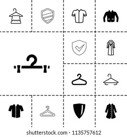 Coat icon. collection of 13 coat filled and outline icons such as hanger, jacket, shield. editable coat icons for web and mobile.