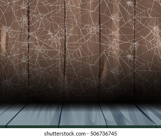 Cobweb on the wooden wall.Spider walk on the floor with cobweb on the orange wall. Concept design for celebrate in Halloween party