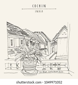 Cochin (Kochi), Kerala, India. Jew Road in Jew Town. Heritage colonial buildings. View of tiled roofs from a window with a plant. Travel sketch, book illustration. Vector hand drawn travel postcard