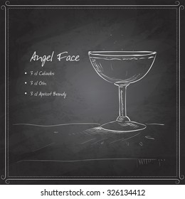 Cocktail angel face on black board with ingredients. Alcohol cocktails theme.