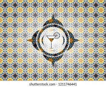 cocktail glass icon inside arabesque emblem background. arabic decoration.