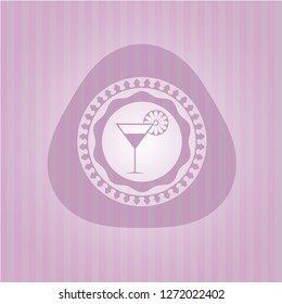 cocktail glass icon inside badge with pink background