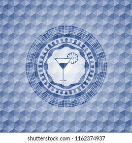 cocktail glass icon inside blue emblem with geometric pattern background.