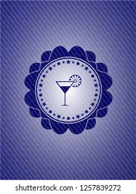 cocktail glass icon inside emblem with denim high quality background