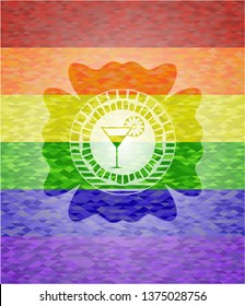 cocktail glass icon inside emblem on mosaic background with the colors of the LGBT flag