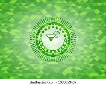 cocktail glass icon inside green emblem with mosaic background