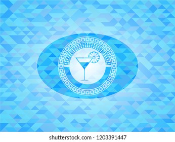 cocktail glass icon inside light blue emblem with triangle mosaic background