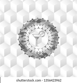cocktail glass icon inside realistic grey emblem with geometric cube white background