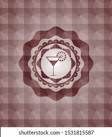 cocktail glass icon inside red seamless badge with geometric pattern background.