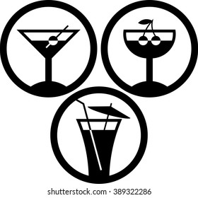 Cocktail glasses with beverages. Martini, liqueur, tequila sunrise 