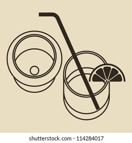 Cocktail glasses with lemon and drinking straw