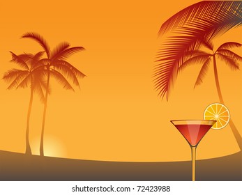 Cocktail on a tropical beach with palm trees at sunset