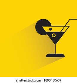 cocktail with shadow on yellow background