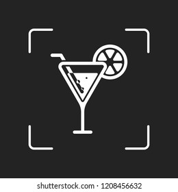 cocktail. simple silhouette. White object in camera autofocus on dark background