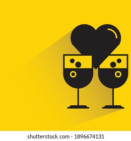 cocktail, wine glasses and heart with drop shadow on yellow background