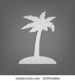 Coconut palm tree sign. Vector. White knitted icon on gray knitted background. Isolated.