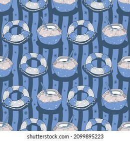 Coconuts and lifebuoys. Seamless pattern on a blue background. Cute vector illustration.