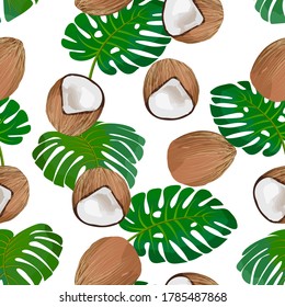 Coconuts and tropical leaves in a pattern.Ripe coconuts and palm leaves on a white background in a colored pattern.